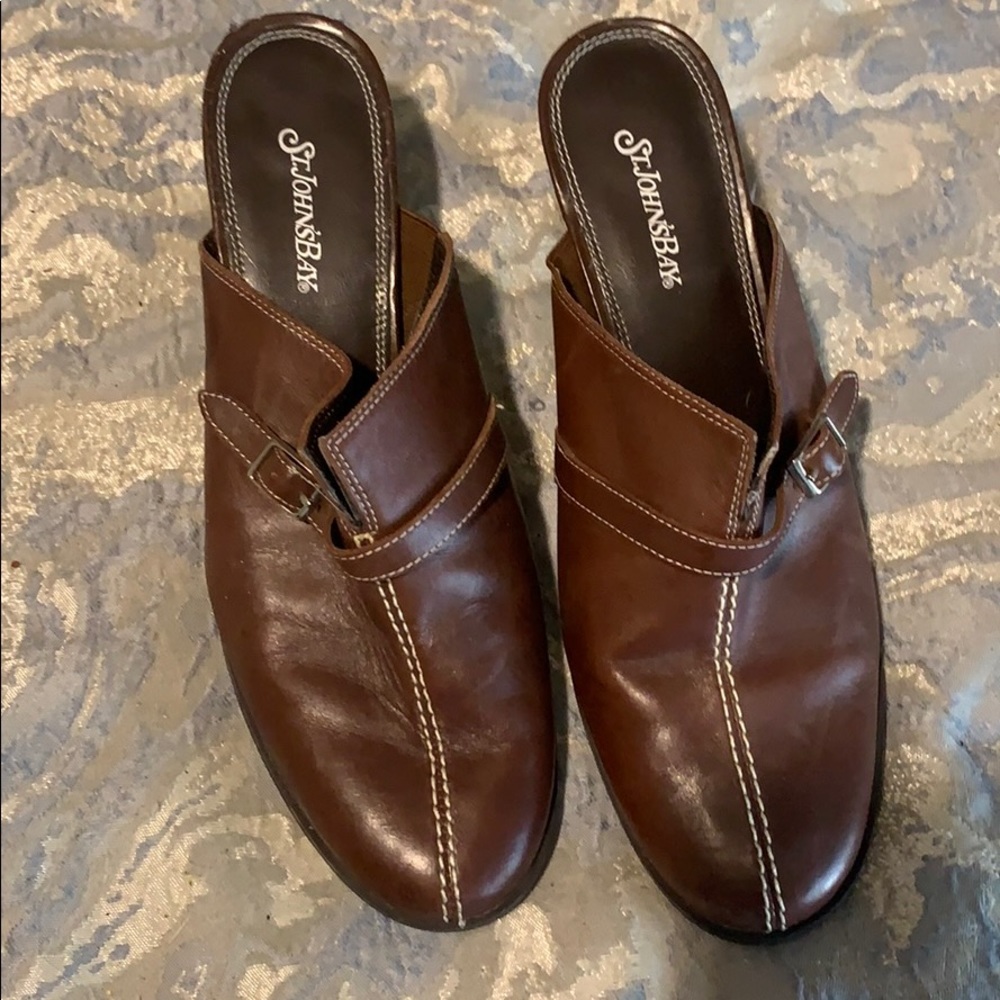 Brown leather clogs